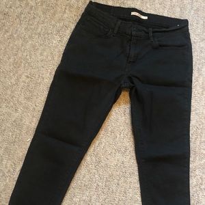 Levi black skinny jeans 710